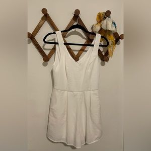 Blue Rain Brand white romper size medium.
